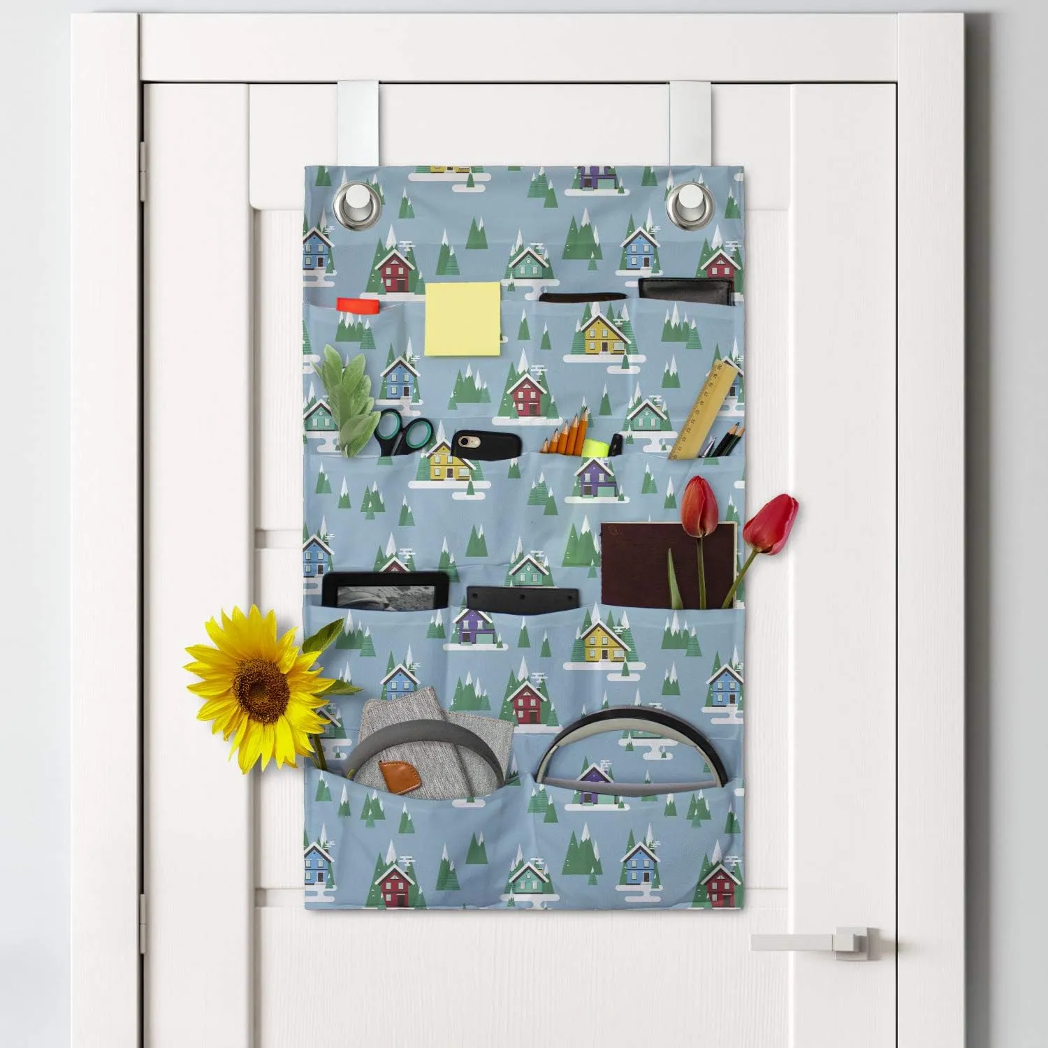 Ambesonne House Hanging Pocket Organizer, Rectangular Trilateral Homes Windows Door Knobs Snow on Pointy Trees Christmas Time, Printed Polyester Storage Bag with Pockets, 21" x 31", Multicolor
